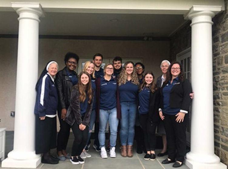 SGA group in front of Marian Hall